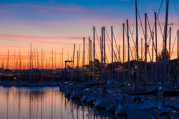 Colorful sunset in the old harbor of La Rochelle, France