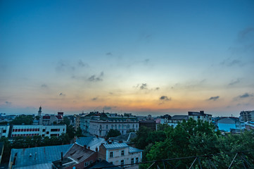 Sunrise over city buildings