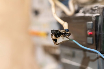 Burned wire, splicing connector, electrical terminal block of nonflammable, fireproof material....