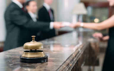 Fototapeta Picture of guests getting key card in hotel. obraz