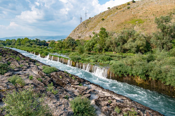 Fototapeta na wymiar The Confluence of Neretva and Buna River have remarkable river gorge along with tufa waterfalls, Mostar, Bosnia and Herzegovina