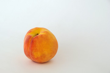 Red-yellow peach fruits on a white background. Summer background.