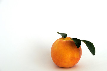 Red-yellow peach fruits on a white background. Summer background.