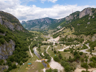 Fototapeta na wymiar Nevidio Canyon is positioned within Durmitor National Park. It is 2 km long and hundreds of meeter deep gorge which is interesting for canyoning.