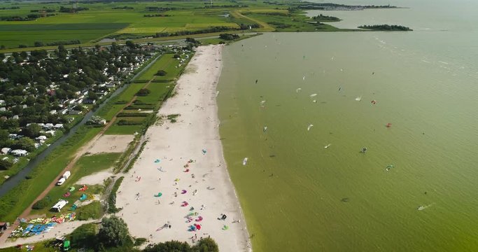 Kitesurfers on the Beach of Workum, Friesland, The Netherlands / Holland 4K Drone Footage
