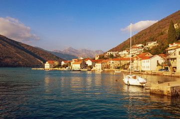 Naklejka premium Beautiful Mediterranean landscape. Montenegro, Adriatic Sea, view of Bay of Kotor and Lepetane village on sunny winter day
