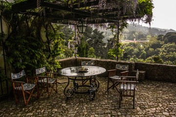 A table and chairs in the garden