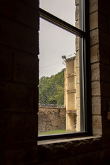 View of prison wall through window