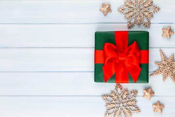 Christmas, holiday present box on red background.