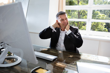 Businessman Sleeping In Office