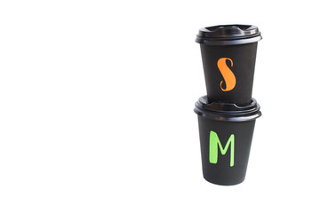 Disposable cardboard black cup isolated on white background, eco cup for hot drinks. Copy space