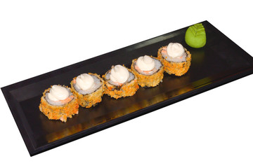 Baked hot sushi rolls. white isolated background.