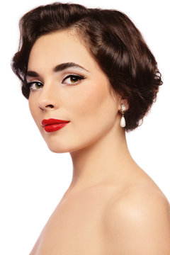 Vintage style portrait of young beautiful girl with red lipstick