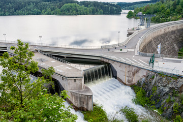 lead hole Dam is a congrete dam across the lead mountains and saale river, overflow, rare event, Saalburg, Thuringia, Germany