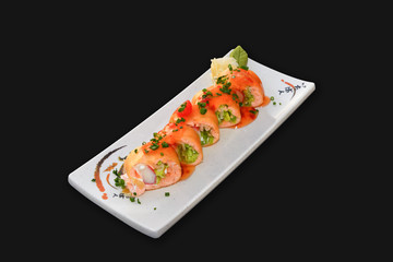 Salmon sushi roll with sauce and peper pout