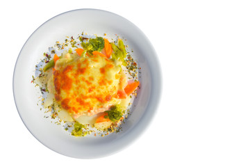 Tasty salmon lasagna with vegetables as a side