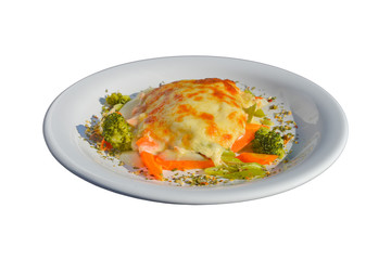 Tasty salmon lasagna with vegetables as a side