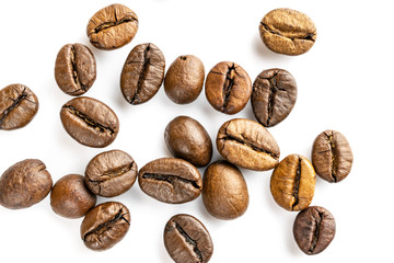 Roasted coffee beans isolated in white background cutout. Coffee background or texture concept.