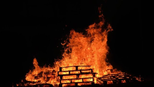 Wood burns in strong fire and high blaze