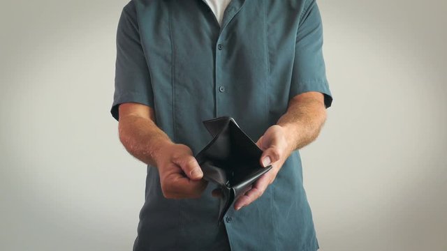 4K: Man Showing Off Empty Wallet With No Cash