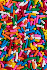 Bright close up rainbow sprinkles background