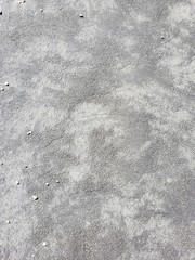 concrete driveway with small stones 