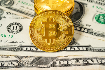 Bitcoins on US Dollar bills