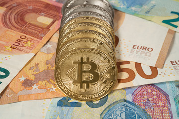 Bitcoins on Euro bills
