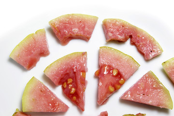 red guava sliced pattern on white background