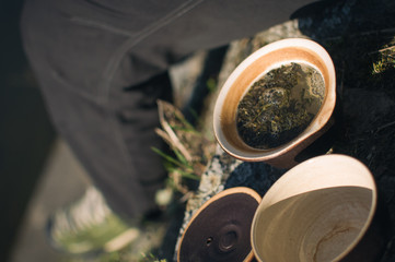 Obraz na płótnie Canvas Drinking tea on the riverside in Brno, enjoying early spring sunshine