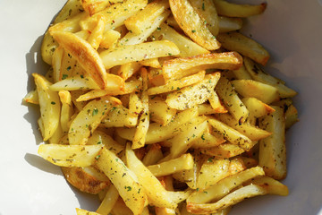 oven roasted potato chips on a plate