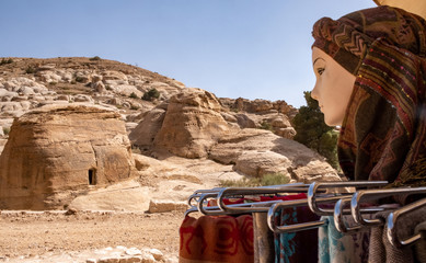 Mannequin head with a scarf on the archeological site of Petra