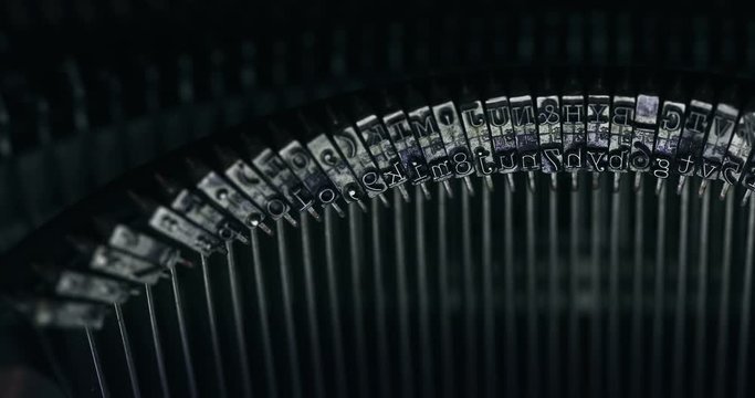A Detail Slider Shot Of Well-Inked Typewriter Bars