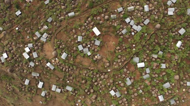 Africa culture and traditions - overhead drone shot of historic human settlement and active tribal community living in Konso village in South Ethiopia