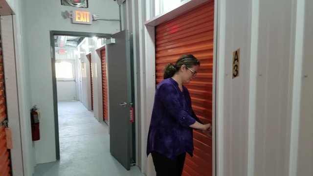 Woman opens self-storage locker