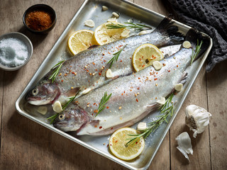 two raw trout fishes