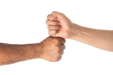 Two men bumping fists isolated on white