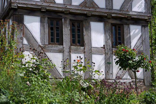 Facade of old traditional German half-timbered house 