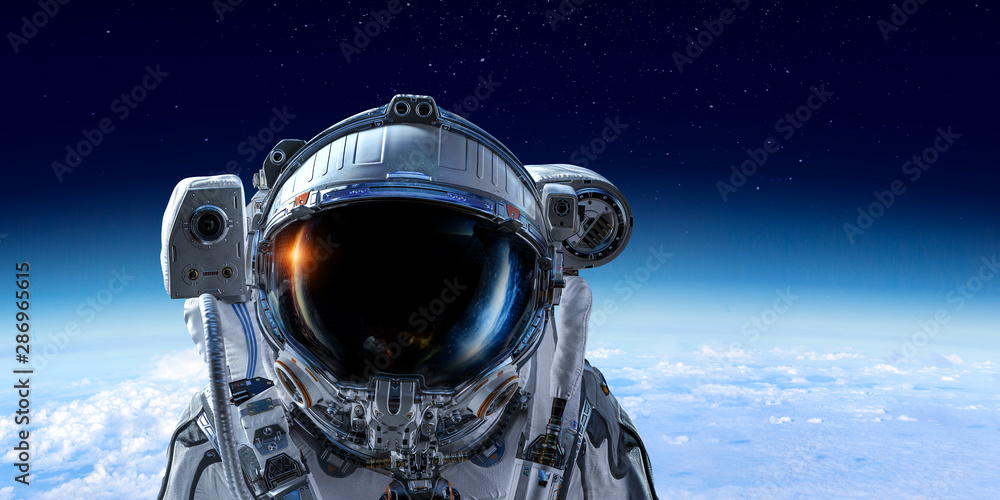 Wall mural exploring outer space. mixed media