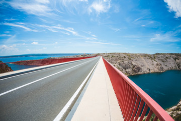 Obraz na płótnie Canvas Red Bridge over the canyon in Croatia.