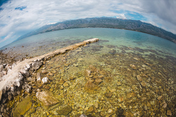 Old stone pier on the Adriatic coast.