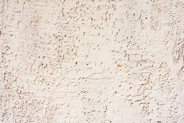 Texture of a concrete wall with cracks and scratches which can be used as a background