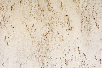 Texture of a concrete wall with cracks and scratches which can be used as a background