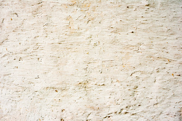 Texture of a concrete wall with cracks and scratches which can be used as a background