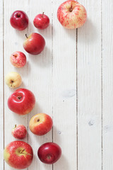 apples on wooden white background