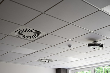 Projector placed on the ceiling ceiling.