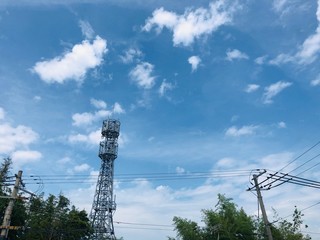 high voltage tower in the sky