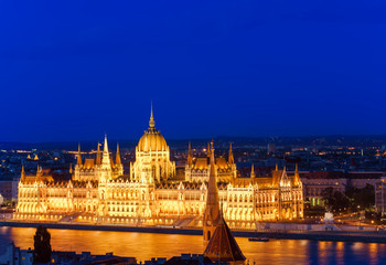 Fototapeta na wymiar Budapest parliament building at night. blue sky background