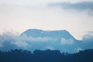Rocky mountain peak white cloud