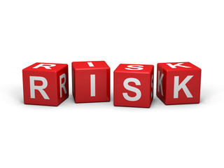 The word RISK out of red letter dices